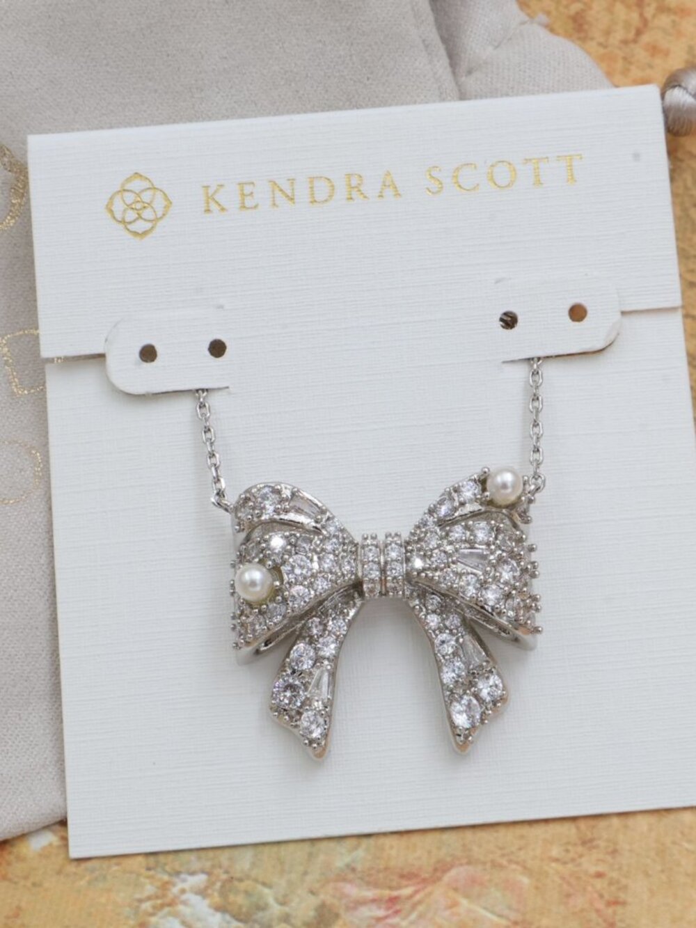 New Kendra Scott White Mix Krista Bow Necklace Silver - Picture 1 of 2